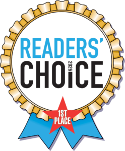 Readers' Choice 2026 first place award badge with a gold rosette and blue ribbons.